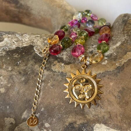 Collier Cristal de Roche, Médaille Soleil