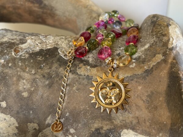 Collier Cristal de Roche, Médaille Soleil